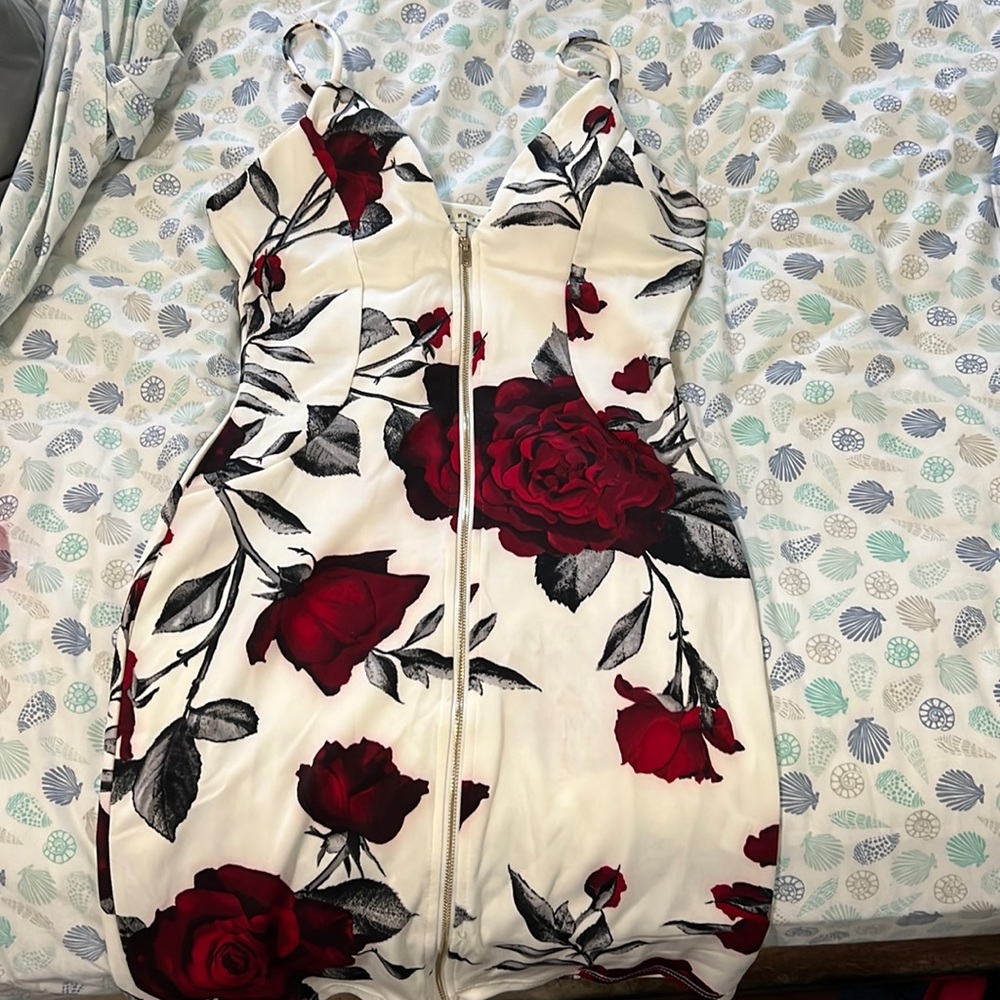White dress with red rose design